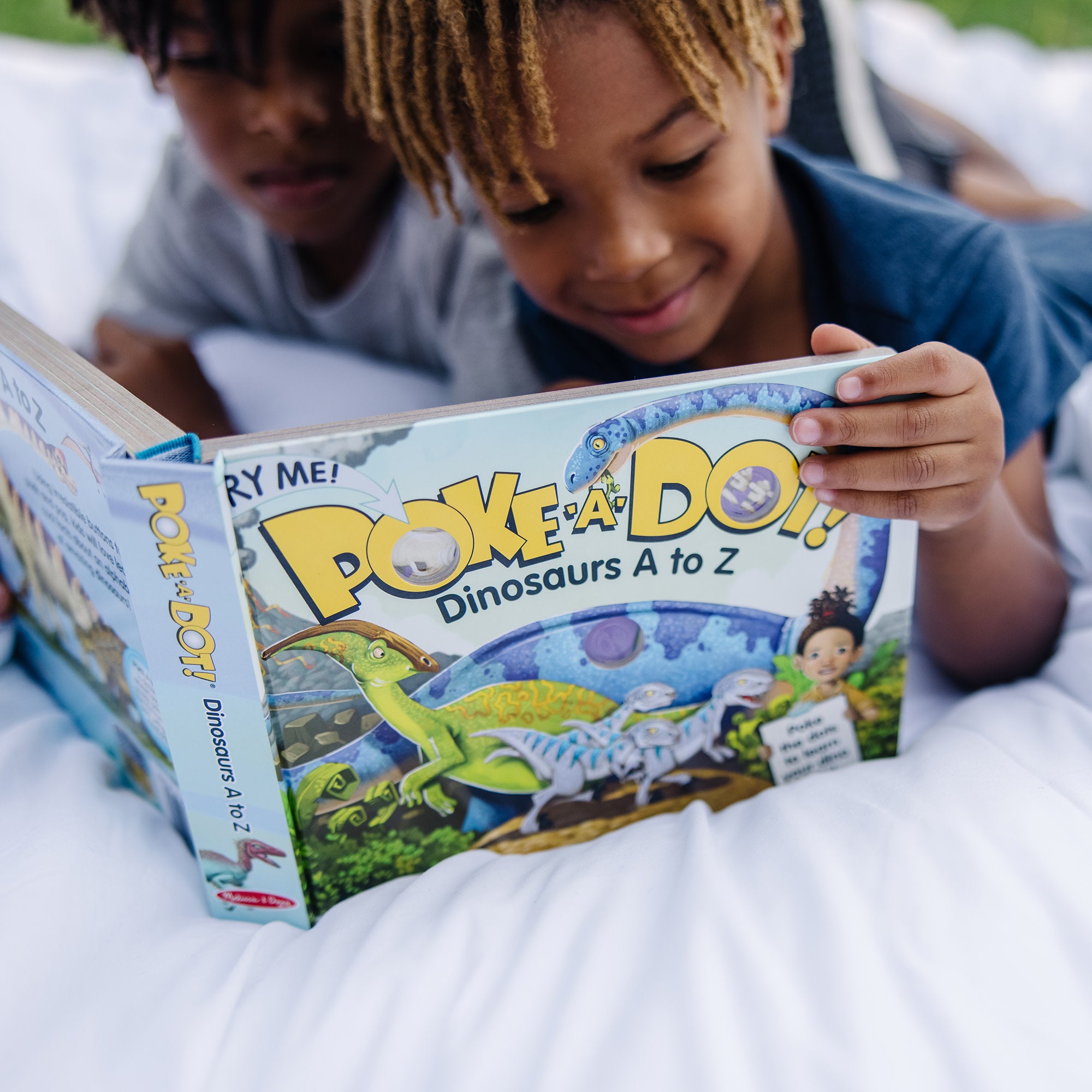 Melissa & Doug Poke-a-Dot: Dinosaurs A to Z Board Book - Image 4