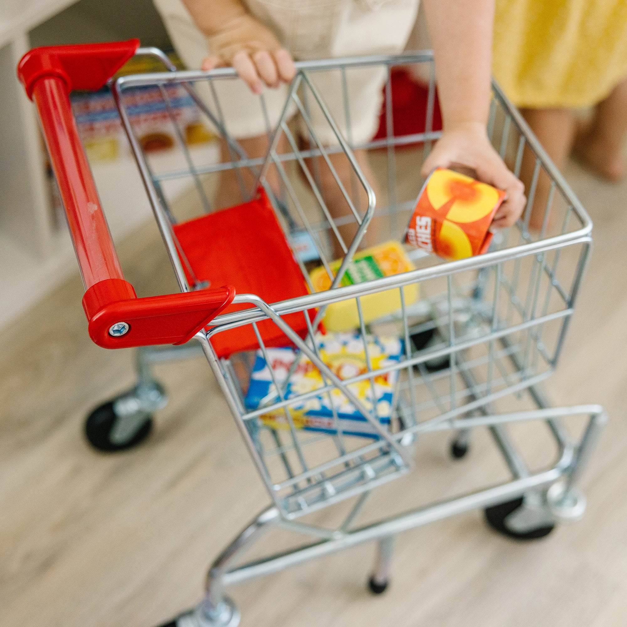 Melissa & Doug Metal Grocery Shopping Cart Toy - Image 5