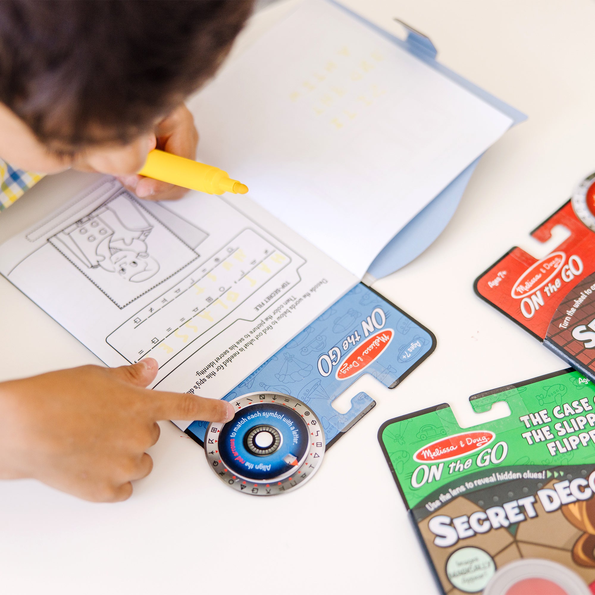 Melissa & Doug On the Go? Secret Decoder Activity Books 3-Pack: Slippery Flippers, Runaway Ruby, Game Book - Image 7