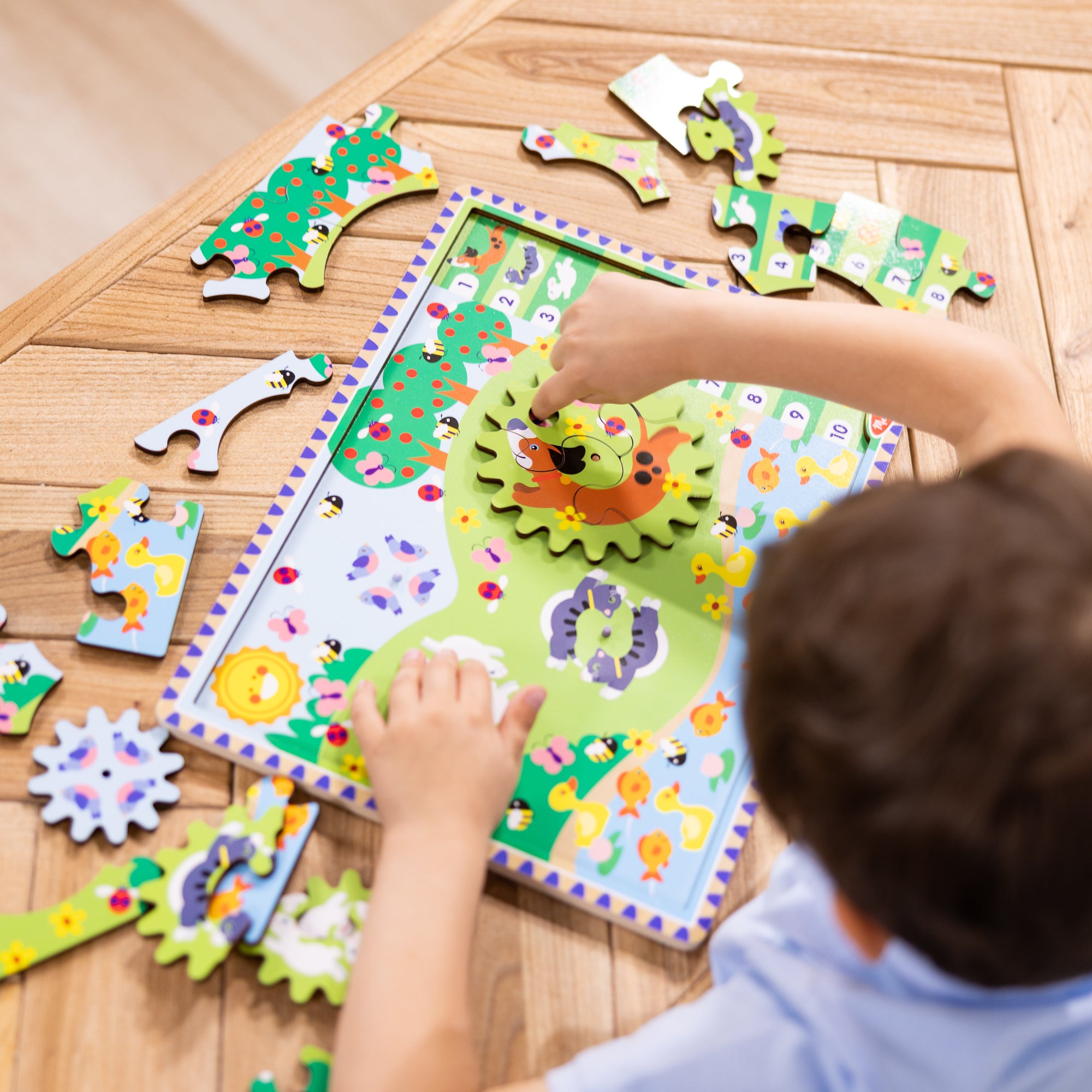 Melissa & Doug Animal Chase I-Spy Wooden Gear Puzzle - Image 2
