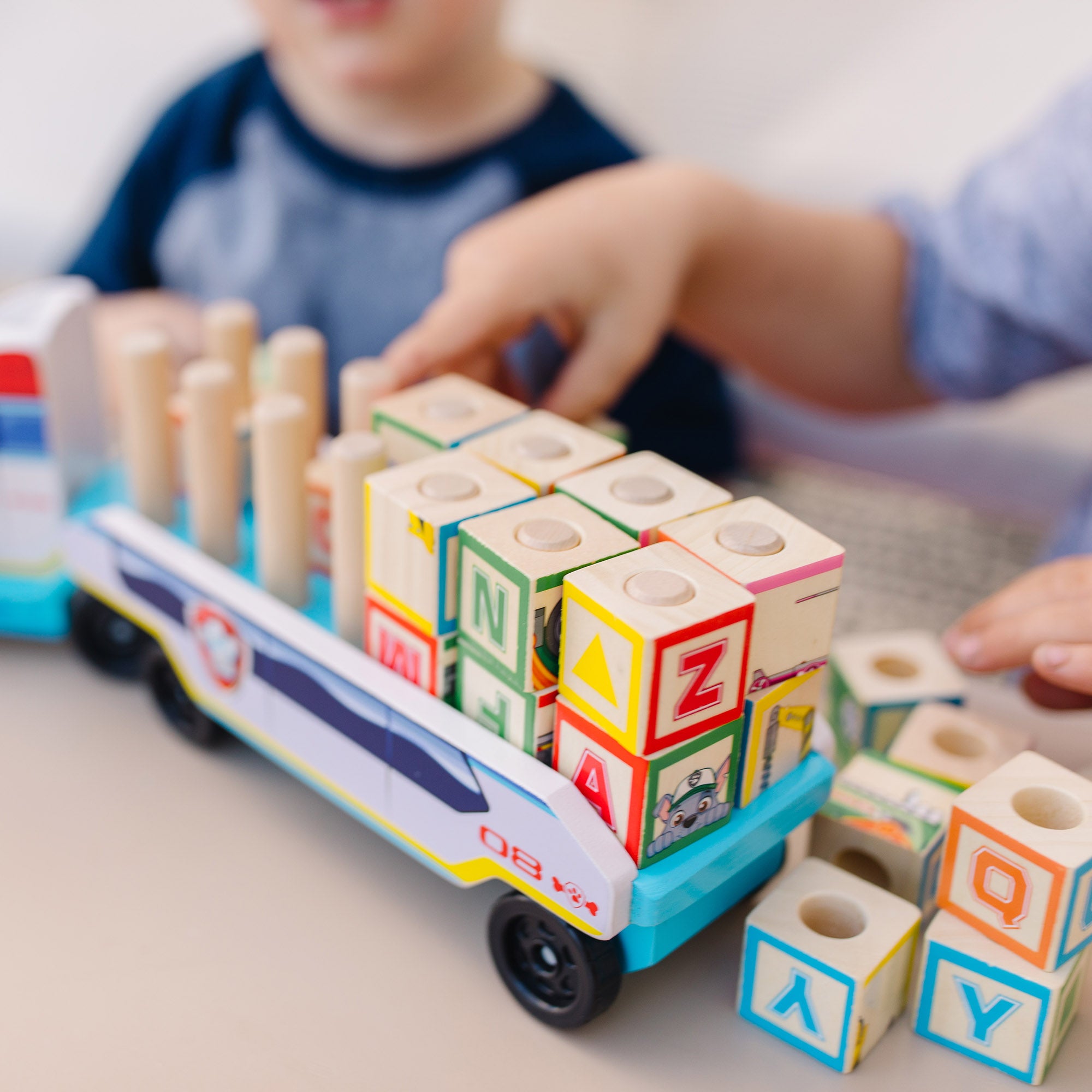 Melissa & Doug PAW Patrol Wooden ABC Block Truck - Image 4