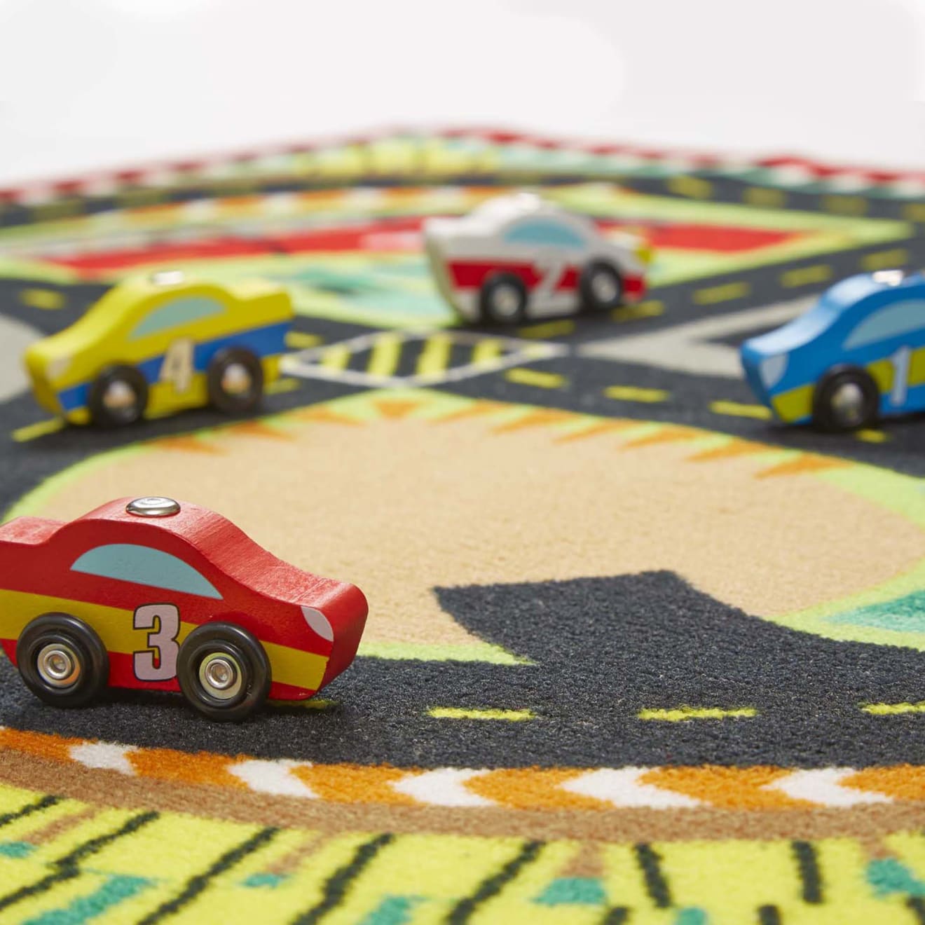 Melissa & Doug Round the Speedway Race Track Rug & Car Set - Image 9