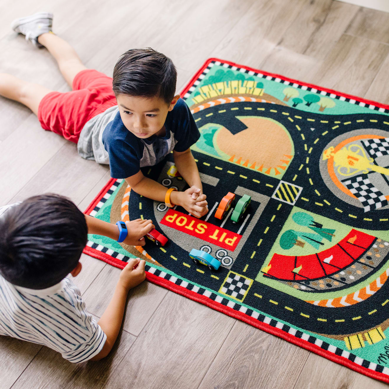 Melissa & Doug Round the Speedway Race Track Rug & Car Set - Image 2