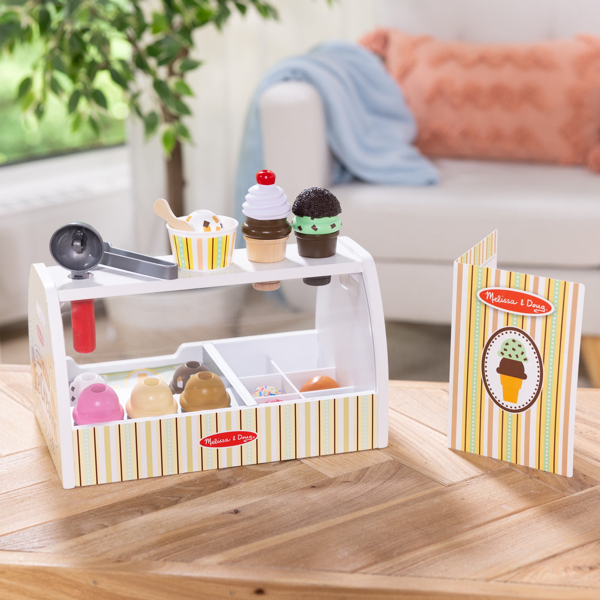 Melissa & Doug Scoop & Serve Ice Cream Counter - Image 9